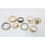 9ct gold wedding band, 9ct gold eternity ring, two 9ct gold rings, (one split), two yellow metal