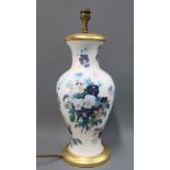 A decoupage effect table lamp, probably Vaughan of Chelsea, of baluster form with turned gilt wood