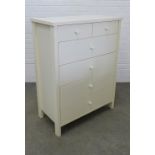 Modern chest, the rectangular top above two short and three long drawers, retailed by John Lewis.