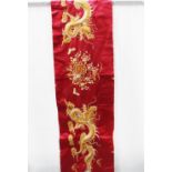 Chinese pink silk panel embroidered with dragons, 185 x 35cm