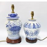 Two blue and white chinoiserie pottery table lamp bases, on wooden bases, 32cm excluding fittings (