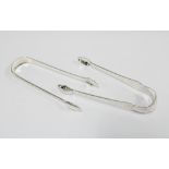 Two Scottish silver sugar tongs to include Old English flared bright cut with makers mark of