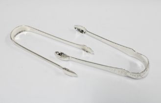 Two Scottish silver sugar tongs to include Old English flared bright cut with makers mark of