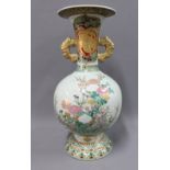 Kakiemon style twin handled Armorial vase, likely late 19th century, (restored) 47cm high