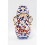 Imari double gourd vase with mythical beast side handles, 22.5cm.