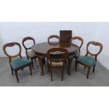 Mahogany dining table with an extra leaf and a set of six mahogany balloon back chairs . 72 x 134