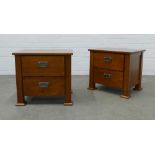 Pair of contemporary hardwood bedside chests, two drawers with pewter handles and flat stylised