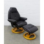 Leather reclining chair and footstool. 110 x 85 x 52cm. (2) (a/f)