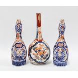 A pair of Japanese Imari double gourd vases and another of bottle neck form, (3) 22cm.