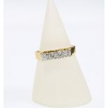 9ct gold dress ring claw set with a row of four brilliant cut diamonds, stamped 18ct, size P1/2