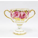 Cauldon twin handled campana vase, hand painted with roses and gilded, signed S. Pope, 17 x 23cm.