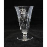 QEII coronation etched ale glass on circular foot, 17cm.
