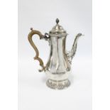 18th century London silver coffee pot, circa 1760's, domed cover with spiral finial, baluster form