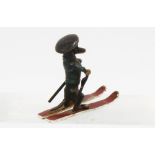 20th century cold painted bronze figure of a Skiing Dachshund, 4.5cm high