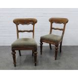 Pair of 19th century mahogany chairs with scroll carved top rails, horizontal splats, and drop-in