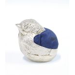 Edwardian silver pin cushion in the form of a bird emerging from an egg, by Sampson Mordan & Co,