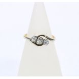 18ct gold three stone diamond crossover ring, size N