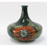 Rozenburg den Haag pottery vase, bulbous form with bottle neck, painted with stylised flowers,