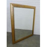 Large modern gilt framed mirror. 136 x 107cm.