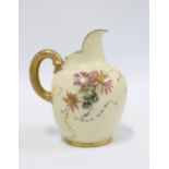 A Royal Worcester Blush Ivory jug, No. 1094, with hand painted floral decoration, 14cm.