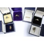 Five 9ct gold gemset rings and a gold plated dress ring (6)