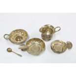 Three white metal taste du vin and a small Birmingham silver cream jug (4)