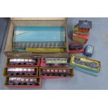 Suitcase containing a collection of vintage Hornby carriages and track, etc (a lot)