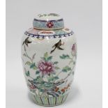 Chinese famille rose vase and cover painted with geese, goldfish, flowers and foliage, 21cm