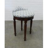 Mahogany stool with a circular upholstered top with spinning action. 58 x 40cm.