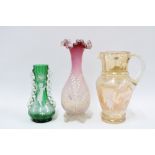Two Mary Gregory coloured glass jugs and a Victorian cameo glass vase (3) 25cm.