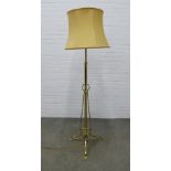 Art Nouveau style brass standard lamp and shade. 155cm high.