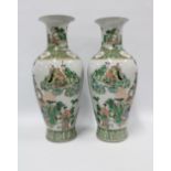 Pair of Chinese famille verte baluster vases, painted with Immortals, each with a six character