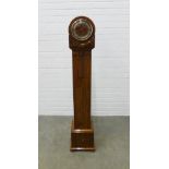 Art Deco walnut grandmother clock, silvered chapter ring and black roman numerals, signed Enfield.