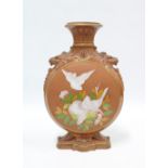 19th century terracotta moon flask vase with lion mask handles and painted floral pattern, (a/f with