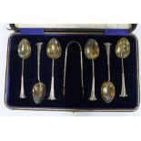 Cased set of six silver teaspoons with matching sugar tongs, Birmingham 1945