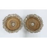 A pair of Sheffield plate wine coasters, Henry Wilkinson, with turned wood bases and fruit and