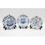 Three 18th century Delft blue and white plates (some damages) 23cm diameter (3)
