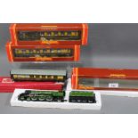 Hornby LNER 4472 and three carriages, all boxed (4)
