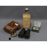 Vintage binoculars with brown leather case, glass bottle and wicker cover and Barrett & Sons,