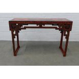 Chinese red and black lacquered altar style hall table, the top decorated with three panels, with