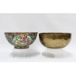 Famille rose punch bowl and a hand beaten brass bowl, (2) 25.5cm.