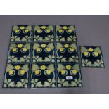 Set of ten tube lined tiles with art nouveau pattern, 15 x 15cm. (10)