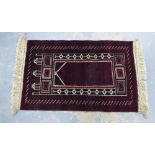 Afghan prayer rug, red field with ivory mihrab, fringed ends, 138 x 85cm