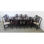 Mahogany extending dining table with a set of 10 chairs including two carver chairs. 75 x 241 x