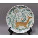 Middle Eastern fritware type dish, painted with deer, 25cm.