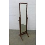 A vintage mahogany cheval mirror. 164 x 47cm.