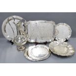 Collection of silver plated trays, an Eastern white metal bowl and a large jug (7)
