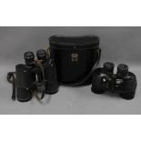 USSR black cased set of binoculars together with a Tasco set of binoculars. (2)