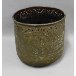 Middle Eastern bronze patinated metal planter, 25cm high