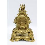 French Raingo Freres, Paris, git metal mantle clock, rococo style with pierced side panels and